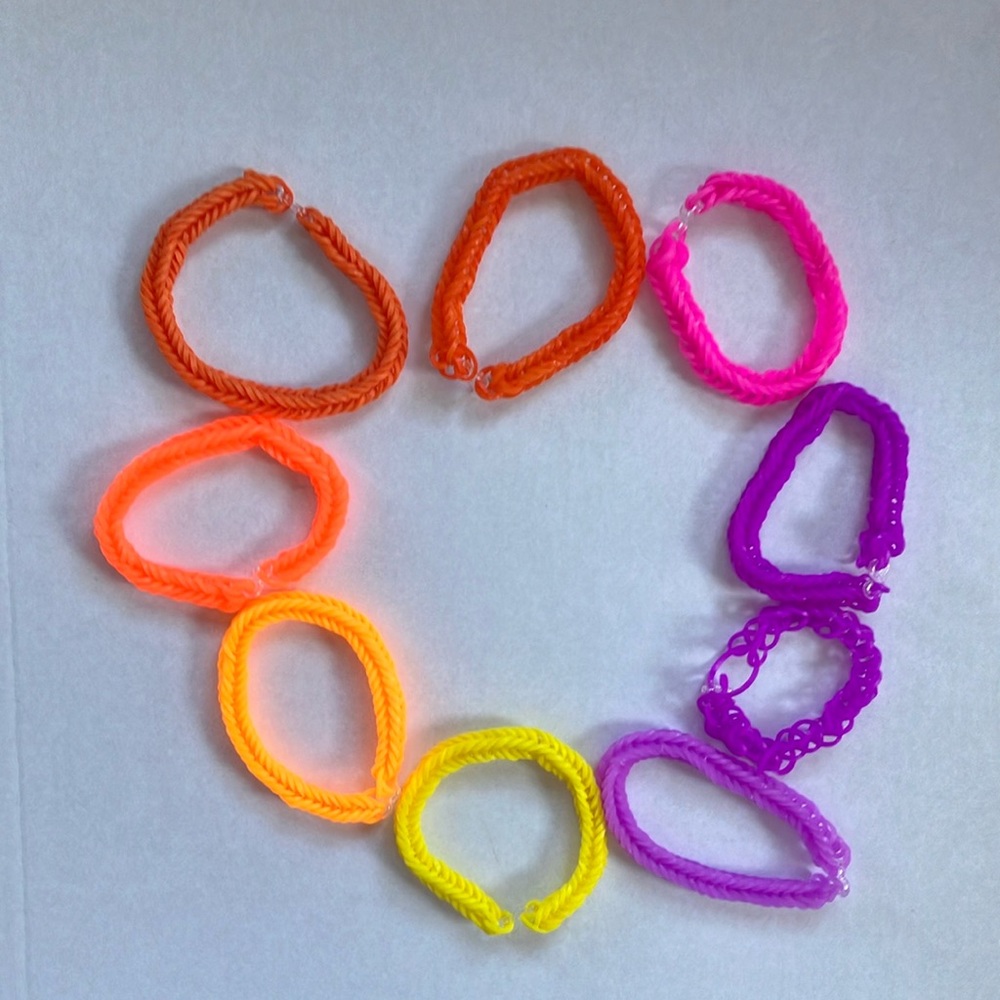 9 handmade pink orange and yellow bracelets
